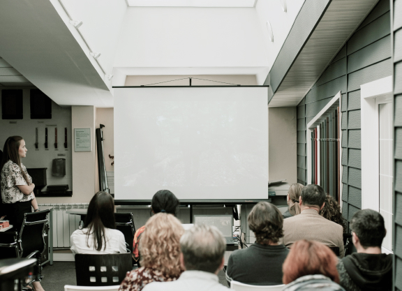 A Georgia Southern classroom filled with students looking at a projector screen.