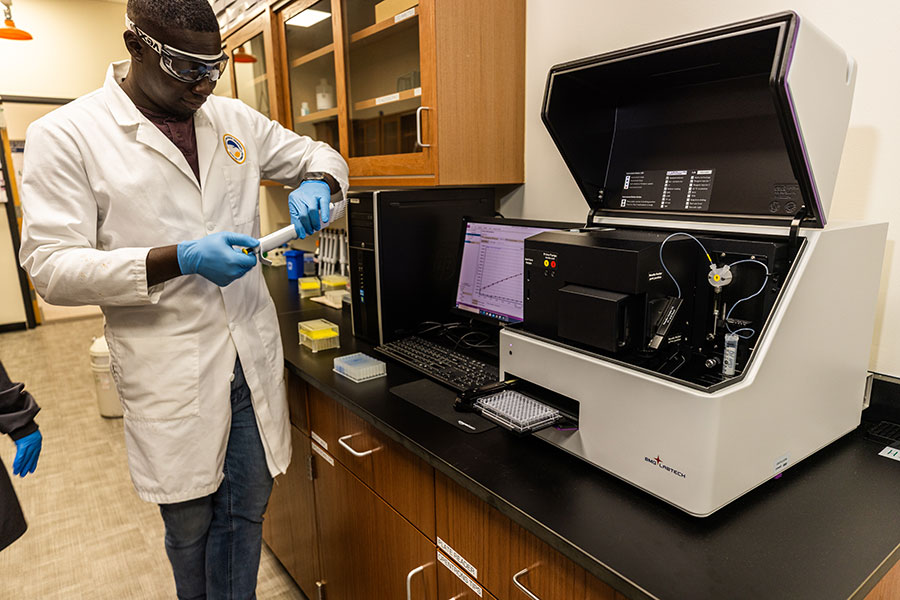 Lab technician experimenting with samples