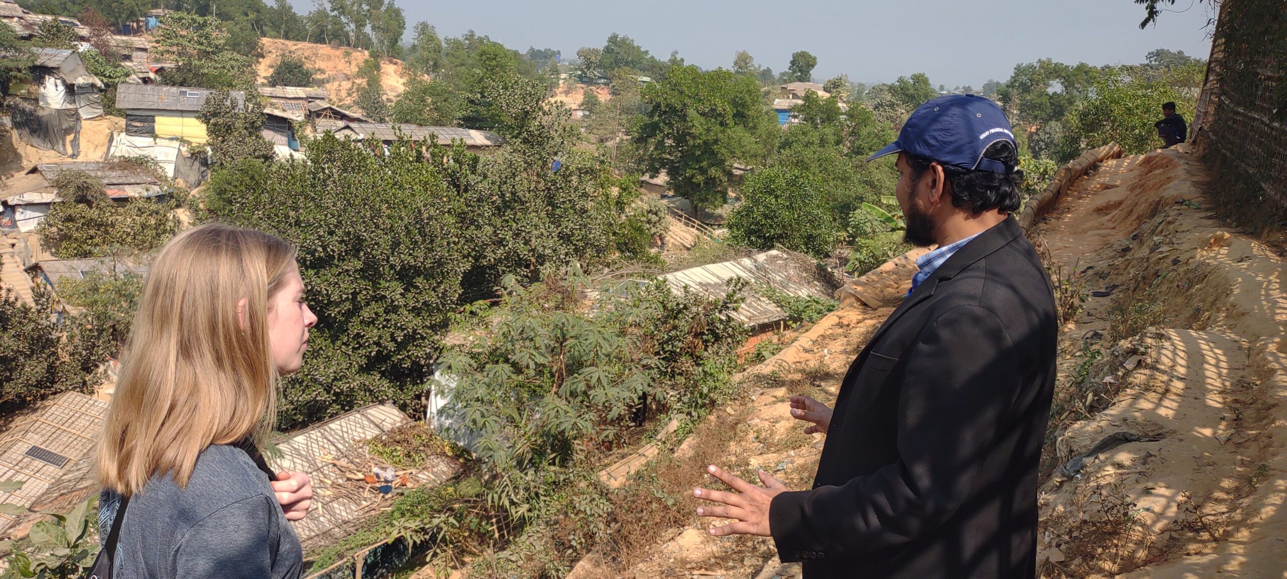 Graduate student and professor survey the land
