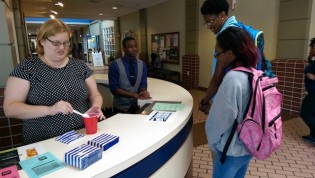 Nicole Withers, administrative coordinator for the Office of Alcohol & Other Drug Programs, prepares a non-alcoholic 'mocktail' for students as part of National Collegiate Alcohol Awareness Week (NCAW) held in Oct. The 